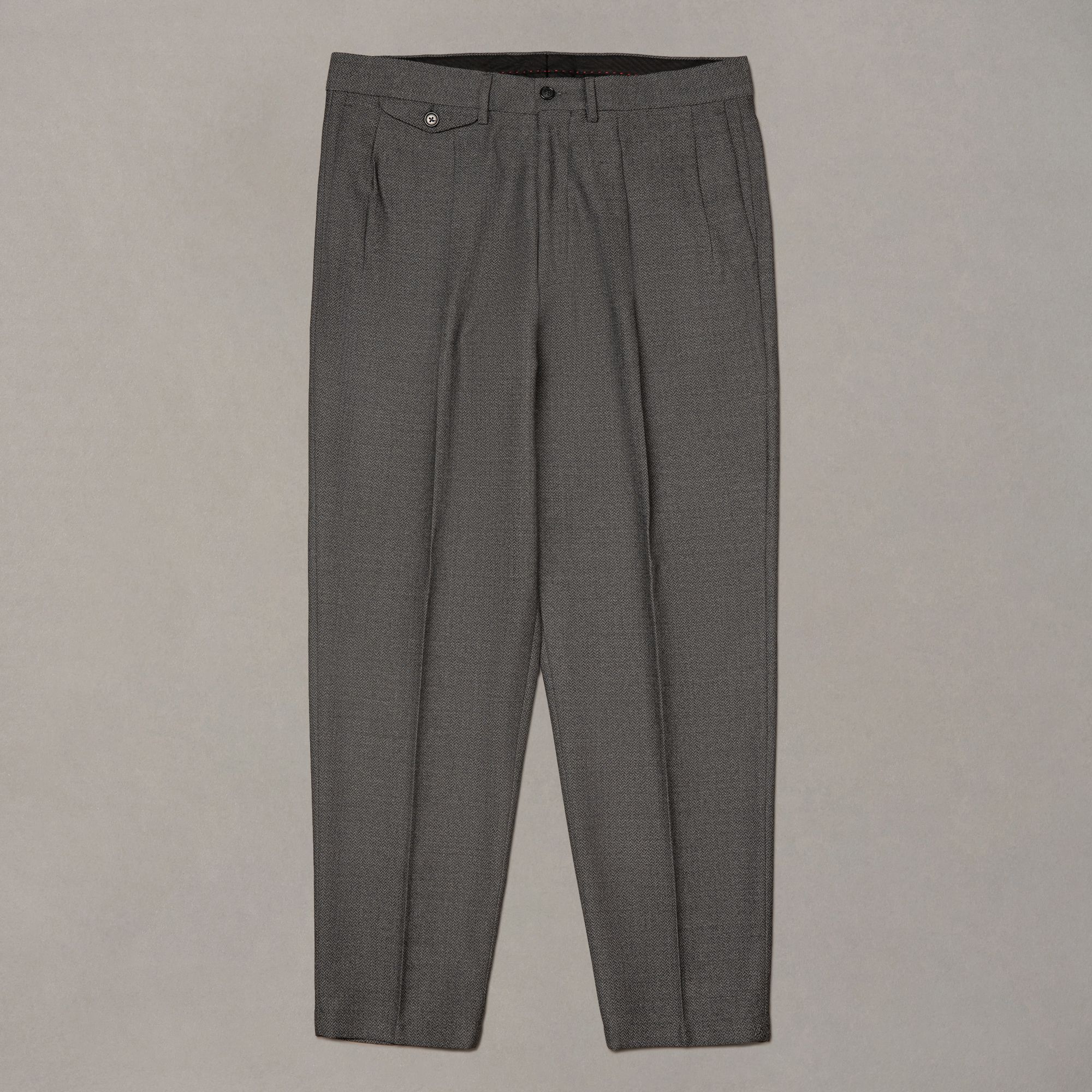 Pantalone grigio in lana fantasia di Elio Evan, con doppie pinces e gamba ampia