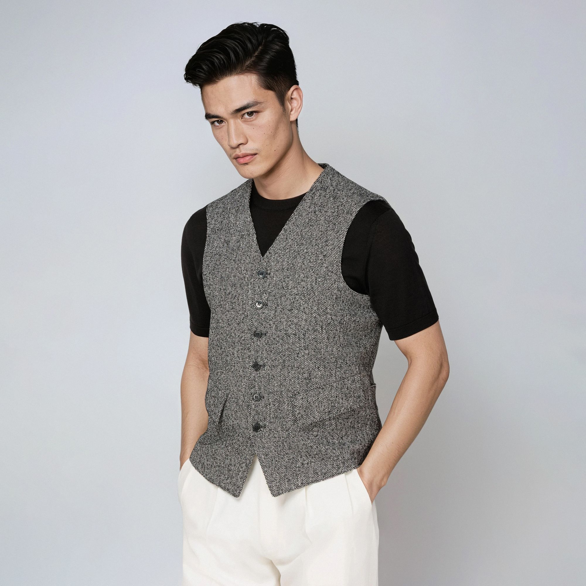 Gilet uomo bouclé mélange modello Armour con tasche applicate e doppia cintura posteriore – Elio Evan.