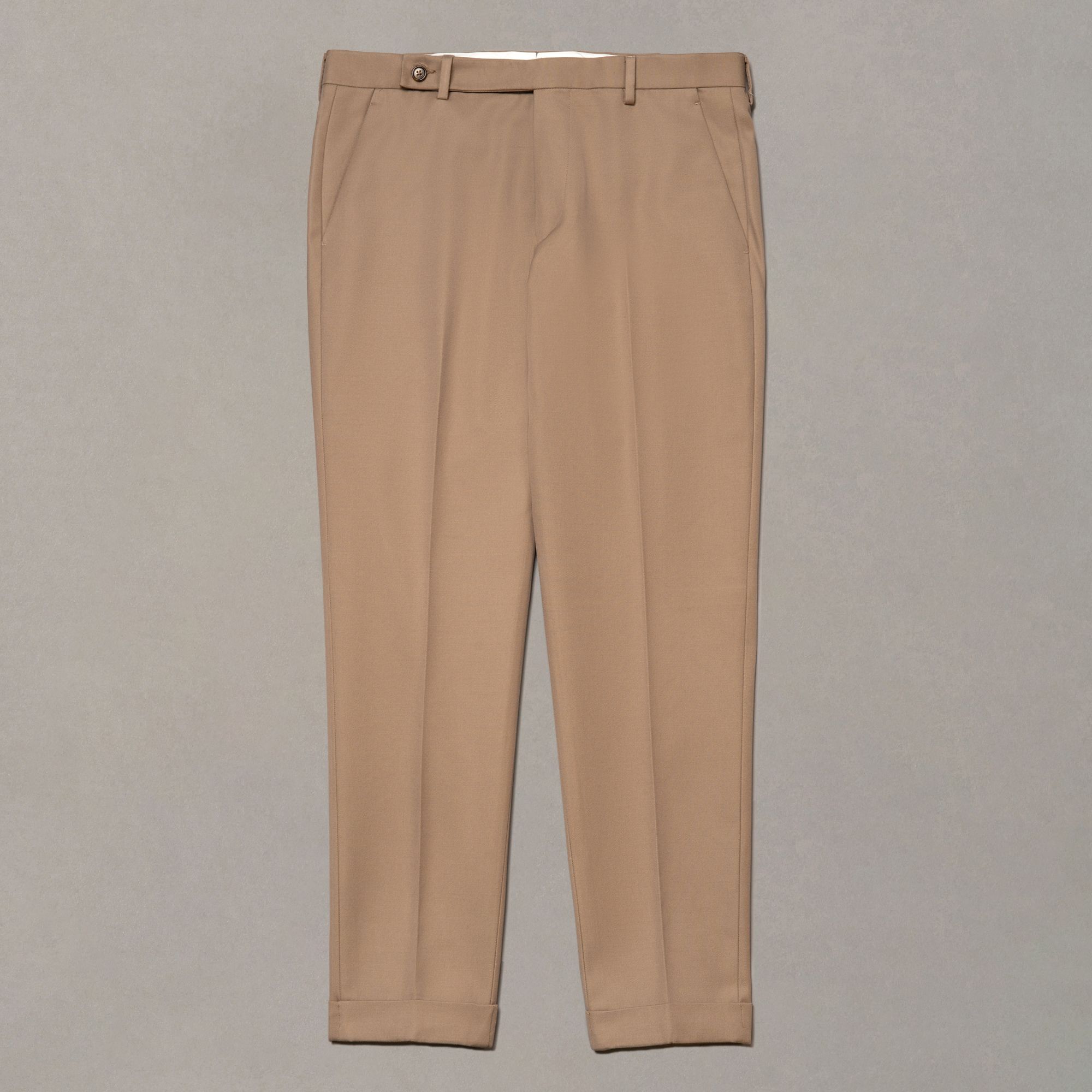 Pantalone beige in cotone e lana di Elio Evan, con superficie liscia e disegno unito