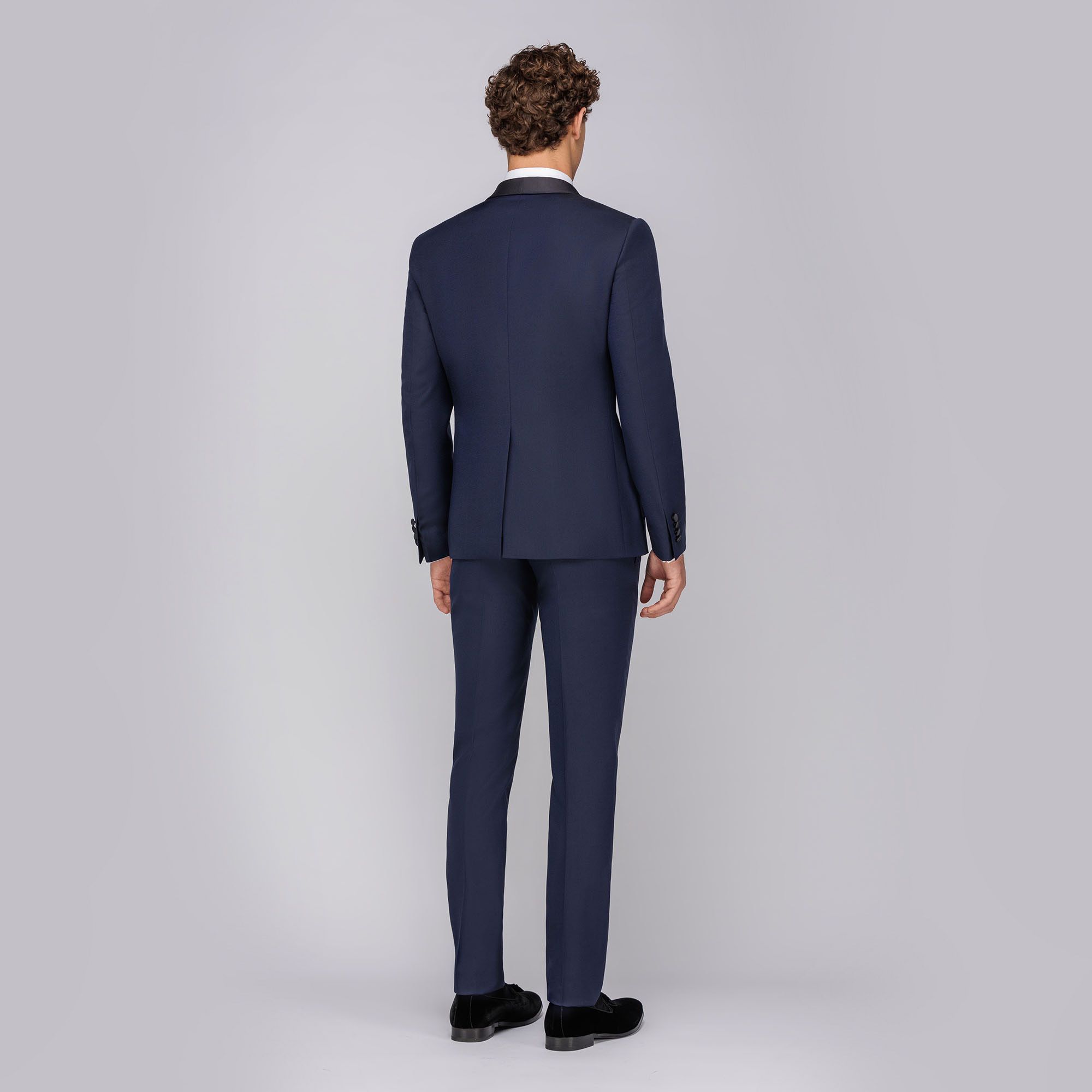 Abito smoking con gilet blu